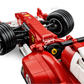 Close-up of the LEGO® Icons Ferrari F2004 & Michael Schumacher model by Legos - Toyhouse, showcasing detailed Bridgestone tires, Ferrari logos, and arrows highlighting features inspired by Schumacher's Formula 1 legacy.
