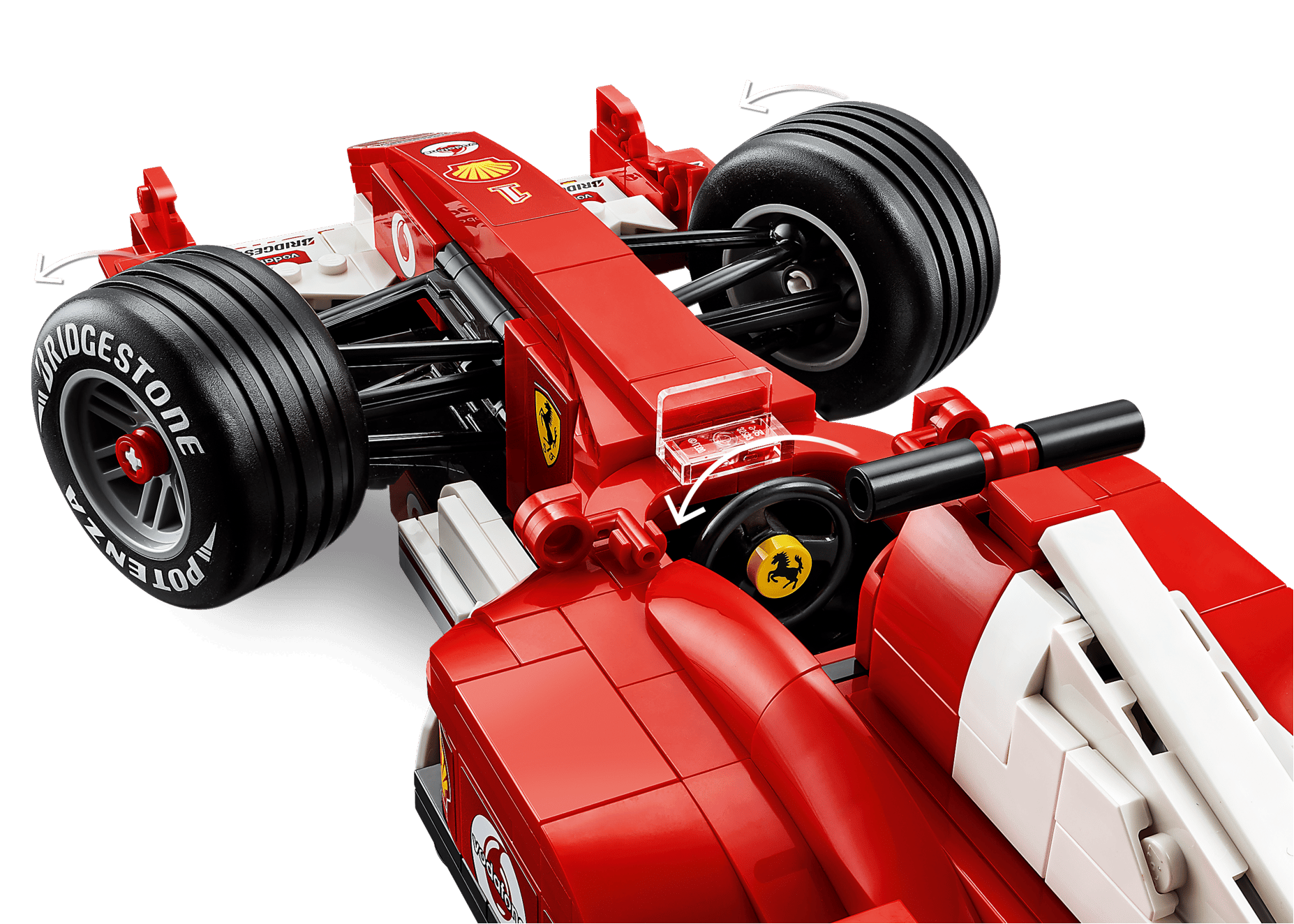 Close-up of the LEGO® Icons Ferrari F2004 & Michael Schumacher model by Legos - Toyhouse, showcasing detailed Bridgestone tires, Ferrari logos, and arrows highlighting features inspired by Schumacher's Formula 1 legacy.