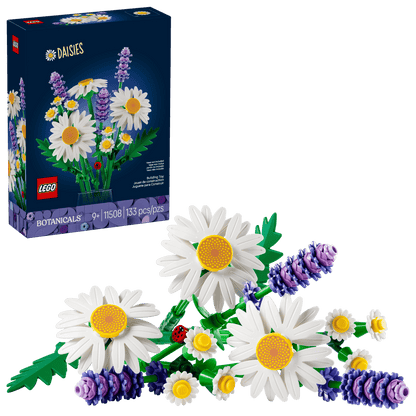 The Legos - Toyhouse LEGO® Botanicals Daisies set includes a buildable bouquet of daisies and lavender—perfect as a decorative flower set for kids or collectors. Shown assembled in front of its packaging.