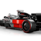 The LEGO® Speed Champions Audi Revolut F1® Team R26 Race Car by Legos - Toyhouse features black, red, and gray colors with Revolut and Audi logos—a must-have Formula 1 toy shown from a rear three-quarter angle on a white background.