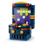 The LEGO® Creator 3-in-1 Retro Gaming Console by Legos - Toyhouse features a blue and orange retro arcade design with two joysticks and a pixel screen—ideal for gamer room decor or retro gaming fans.
