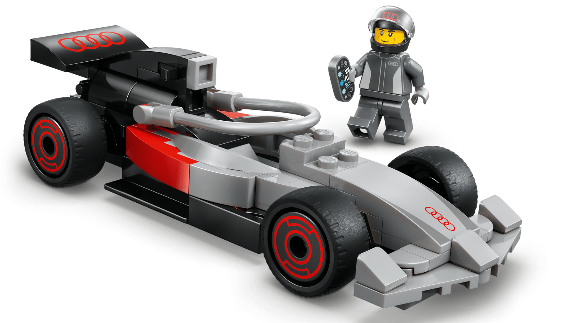 Build your collection with the LEGO® City F1® Display Truck with Audi F1® Race Car by Legos - Toyhouse, featuring a race car with Audi logo, red and black details, and a minifigure driver in a gray racing suit with helmet and wrench.