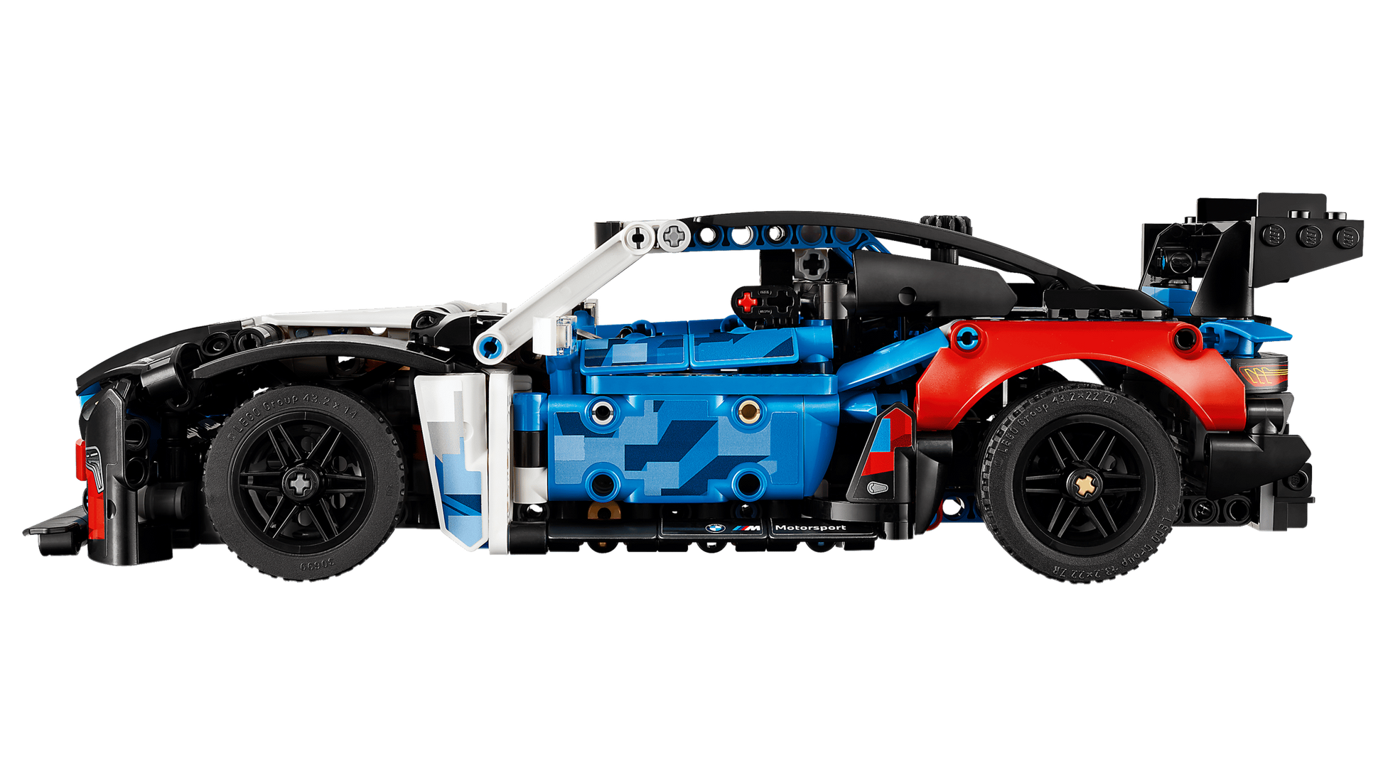 Side view of the LEGO® Technic™ BMW M4 GT3 EVO Race Car by Legos - Toyhouse, in blue, black, and red with visible wheels, spoiler, and detailed body—ideal as a STEM toy or model kit for car enthusiasts.