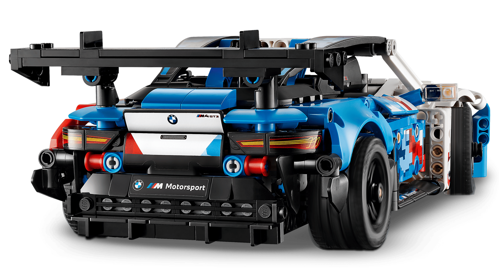 Rear view of the LEGO® Technic™ BMW M4 GT3 EVO Race Car by Legos - Toyhouse, a detailed kit with blue and black pieces, racing decals, and large rear spoiler—an ideal STEM toy for motorsport fans.