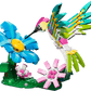 The Legos - Toyhouse LEGO® Creator 3-in-1 Wild Animals: Colorful Hummingbird set features a vibrant hummingbird with a blue and yellow flower and two pink blossoms—a great pick for fans of animal figure sets.