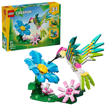 Legos - Toyhouse LEGO® Creator 3-in-1 Wild Animals: Colorful Hummingbird lets you build a vibrant hummingbird near flowers, with the box in the background—ideal for animal figures set collectors.