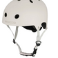 The Banwood Eco Helmet is a white helmet made from recycled materials, featuring ventilation holes, an adjustable chin strap, and a black buckle for a classic look.
