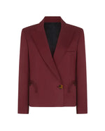 The Novalis Sunfire Blazer by Blaze Milano is single-breasted, dark red, with a notched lapel, black lining, two front pockets, and brown buttons on a white background.