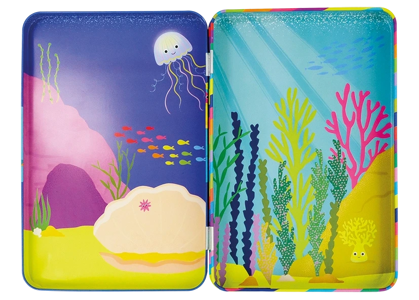 The Floss and Rock Ocean Magnetic Playtime Tin features a vibrant underwater scene with seaweed, rocks, fish, a jellyfish, and coral set against a blue background in an open magnetic tin. This set includes pop-out magnets made from recycled materials for interactive play.