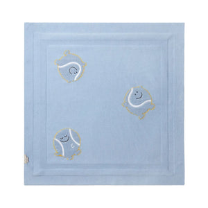 The Stella McCartney Kids Baby Knit Tennis Blanket is made of light blue organic cotton and features three embroidered cartoon-style circles with faces and yellow outlines, each in a unique playful pose on a plain background.