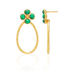 The Berry Clover Teardrop Earrings by Juliska Capucine De Wulf feature hammered gold teardrop hoops and clover studs set with four green stones for a textured, eye-catching look. One earring is front-facing, the other shown from the side.
