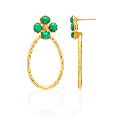 The Berry Clover Teardrop Earrings by Juliska Capucine De Wulf feature hammered gold teardrop hoops and clover studs set with four green stones for a textured, eye-catching look. One earring is front-facing, the other shown from the side.