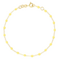 The Gigi Clozeau Classic Gigi Bracelet 6.7" is an exquisite piece crafted in 18 carat yellow gold and adorned with small, evenly spaced yellow beads, completed with a secure clasp closure.