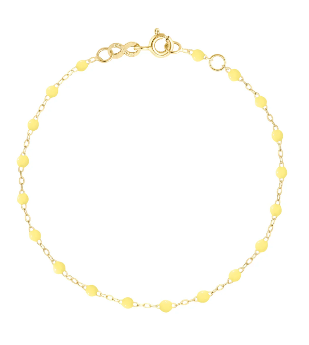 The Gigi Clozeau Classic Gigi Bracelet 6.7" is an exquisite piece crafted in 18 carat yellow gold and adorned with small, evenly spaced yellow beads, completed with a secure clasp closure.