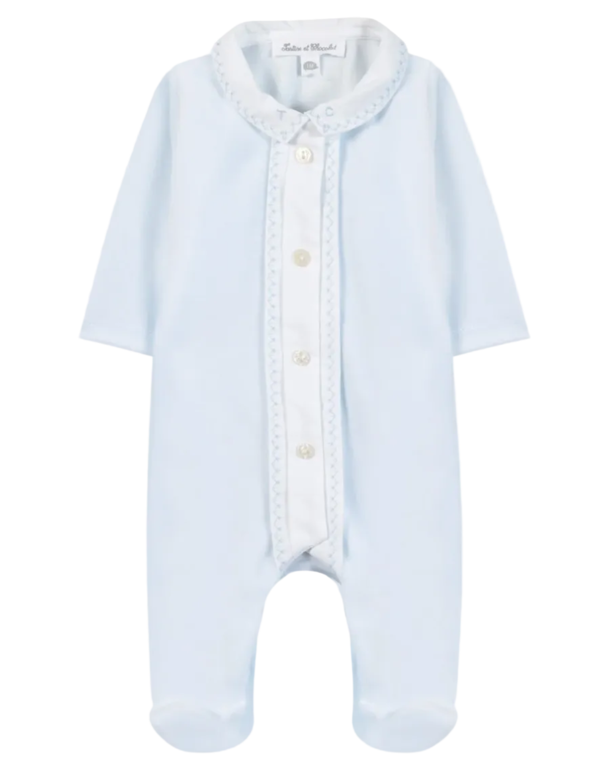 The Baby Boys’ Velvet Pointed Collar Pajamas by Tartine et Chocolat are light blue sleepwear featuring long sleeves, footed legs, a white button placket, and a decorative pointed collar. The garment is displayed flat against a white background.
