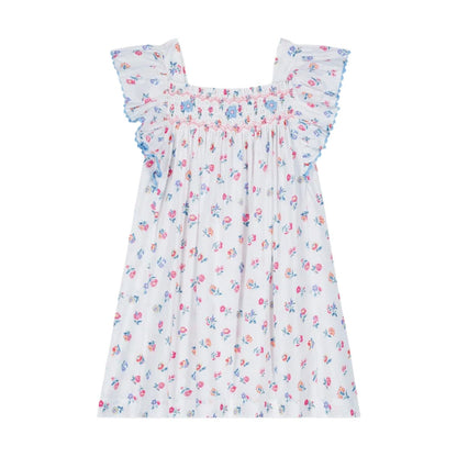 The Girls' Martine Dress by Louise Misha is a white, sleeveless cotton poplin dress for children, featuring floral patterns, a gathered bodice, and ruffled shoulders with blue trim.