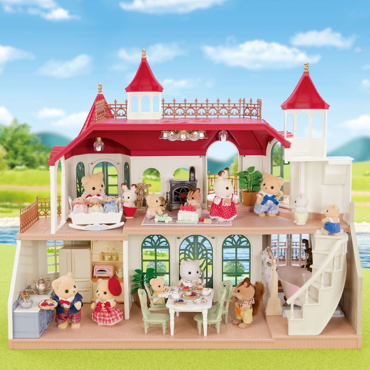 The Calico Critters Red Roof Riverside Manor is a two-story, castle-inspired dollhouse featuring charming animal figurines arranged throughout intricately detailed rooms—including a kitchen, dining area, living room, and bedroom—complete with miniature furniture, accessories, and a whimsical spiral staircase slide that connects both floors.