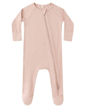The Quincy Mae Baby Bamboo Zip Footie features a light pink color, long sleeves, footed legs, and an asymmetrical zipper running from neck to leg.
