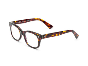 The Caddis Bixby Readers are rectangular tortoise-shell eyeglasses with thick frames and arms, shown on a white background—crafted in a condensed style for smaller faces.