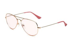 Caddis Mabuhay Readers feature gold frames with pink-tinted lenses and matching pink ear tips, elegantly displayed against a white background.