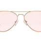 Caddis Mabuhay Readers boast a gold metal frame with pink-tinted lenses, merging a classic aesthetic with blue light protection suited for modern digital lifestyles.