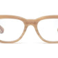 A pair of Caddis Miklos Readers with a beige frame on a white background.