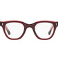 The Caddis Wabi Sabi eyeglasses feature a red tortoiseshell bio-based acetate frame and clear, scratch-resistant lenses, displayed front-facing on a white background.
