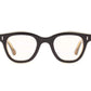 The Caddis Wabi Sabi features thick-rimmed black rectangular eyeglasses with clear, scratch-resistant lenses, displayed front-facing on a white background.