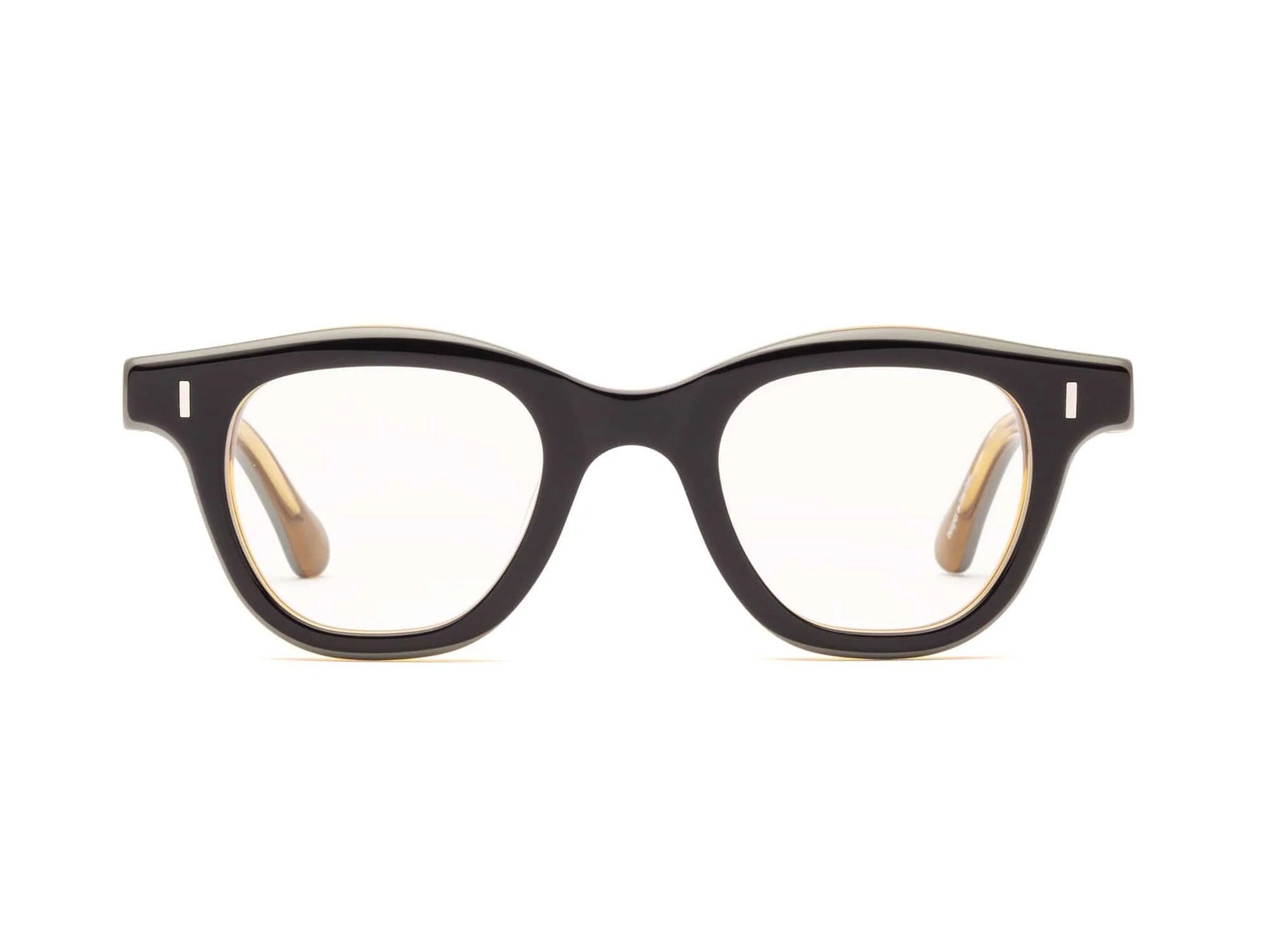 The Caddis Wabi Sabi features thick-rimmed black rectangular eyeglasses with clear, scratch-resistant lenses, displayed front-facing on a white background.