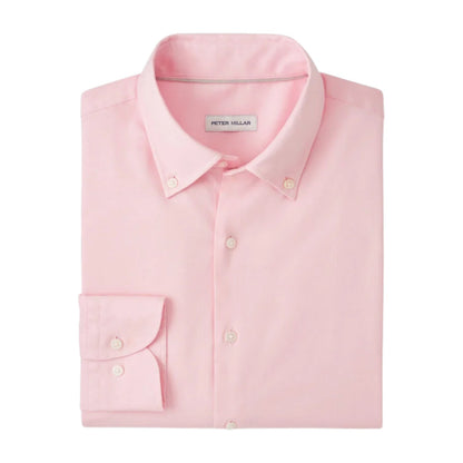 The Campbell Sport Shirt by Peter Millar is a neatly folded light pink cotton Oxford button-up with a button-down collar and visible brand label inside the neck.