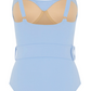 Evarae Cassandra One Piece by Evarae – a light blue swimsuit with wide straps, a belt at the waist, a square neckline, and a nude panel at the bust.