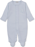 The Kissy Kissy Baby Giraffe Laughs Footie is a light blue, long-sleeve baby onesie made from soft Peruvian cotton, featuring snap closures and charming small embroidered giraffes on the chest—an adorable and cozy sleepwear option for little ones.