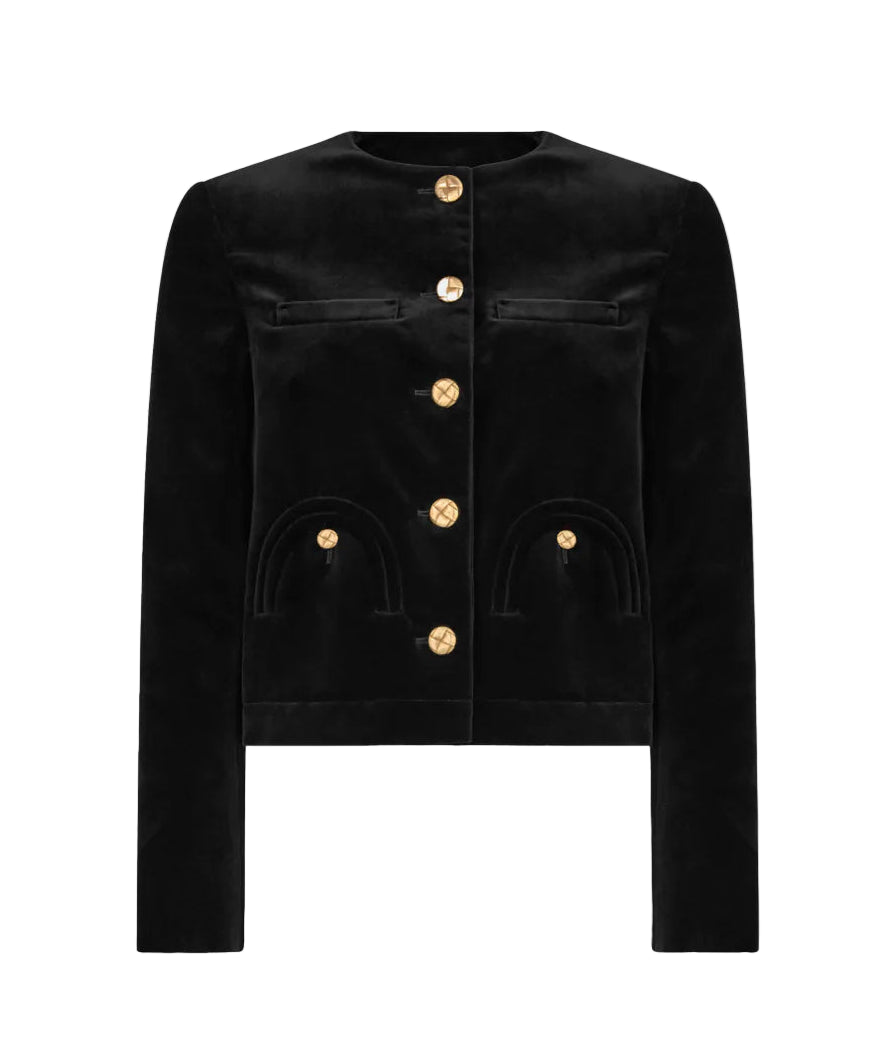 The Jealousy Shamo Bolero by Blaze Milano is a black cotton velvet jacket featuring long sleeves, a round neckline, gold-toned front buttons, and two curved pockets on each side.