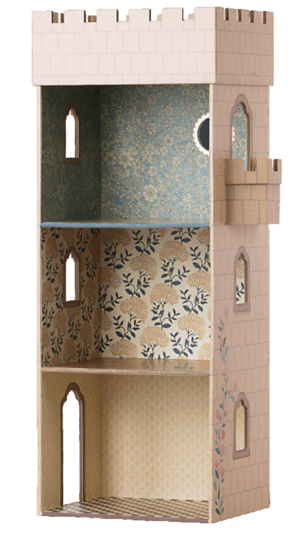 The Maileg Castle with Mirror, a three-story dollhouse by Maileg, is designed to resemble a castle tower and decorated with Maileg prints and patterned interior wallpaper. It features small windows and includes a balcony on the second floor.