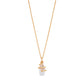 The Juliska Capucine De Wulf Lily Charm Necklace features a large white pearl pendant wrapped in a crystal-studded snake design, elegantly showcased against a plain white background.