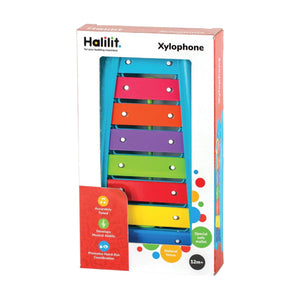 The Crocodile Creek Baby Xylophone comes in packaging and features eight vibrant metal bars with a wooden mallet. This engaging musical toy is designed for children aged 12 months and up.