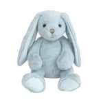 Charlie Bunny by Mon Ami—a light blue plush bunny with floppy ears, black eyes, and a small beige nose, sitting upright against a white background—is the perfect cuddle companion for babies.