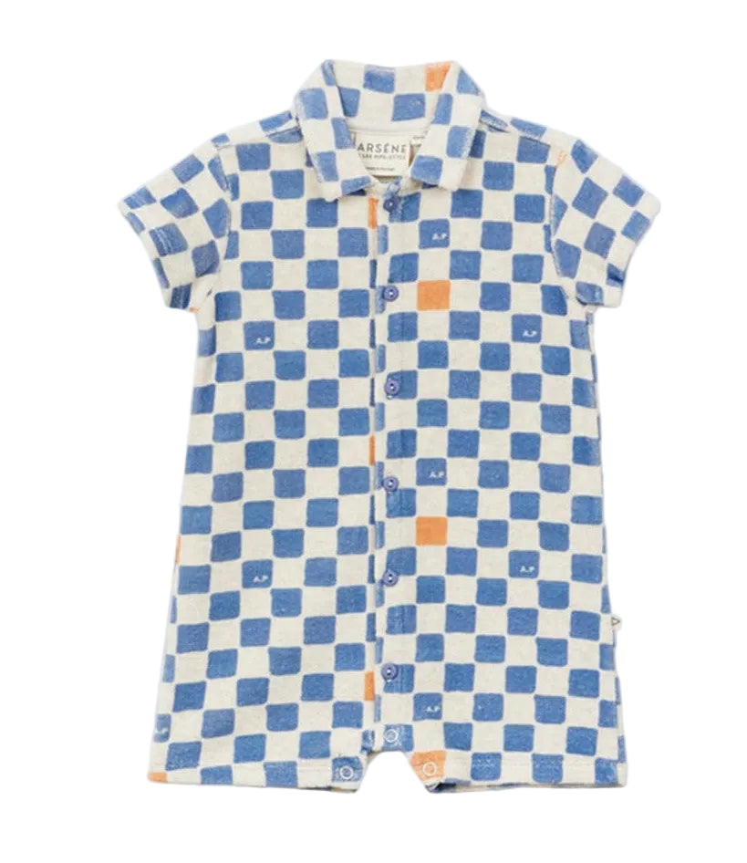 Introducing the Arsene & Les Pipelettes Baby Boys' Terry Checkered Playsuit—a short-sleeved romper crafted from soft organic cotton, featuring a blue and white checkerboard pattern with orange accents, a collar, and front buttons.