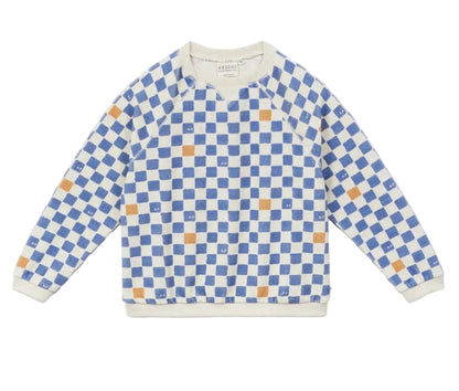 The Arsene & Les Pipelettes Boys' Checkered Terry Cloth Sweatshirt, featuring a blue and white checkerboard print with scattered orange squares, is shown laid flat on a white background.