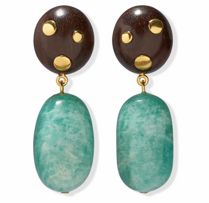 The Lizzie Fortunato Nopales Earrings feature round dark wood tops with three gold studs and large oval amazonite nuggets below, all accented in gold-plated brass.