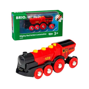 The Brio Mighty Red Action Locomotive features a retro design with yellow details and the "529" label, shown in and outside green Brio World packaging. Suitable for ages 3 and up.