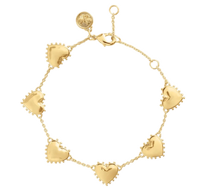 Anabel Aram Heart Station Bracelet in 18k gold plate featuring five heart charms with beaded edges and a small circular coin charm near the lobster clasp.