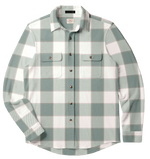 The Faherty Legend™ Sweater Shirt in light green and white plaid features a custom fabric blend, two chest pockets, and long sleeves. The soft knit shirt is shown against a white background.