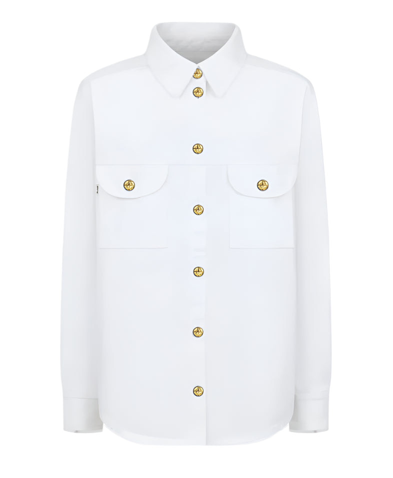 Introducing Blaze Milano's Clapotis Berber Shirt: a white long-sleeve button-up with gold buttons. Ideal for summer, it features a relaxed fit and two chest pockets with buttoned flaps.