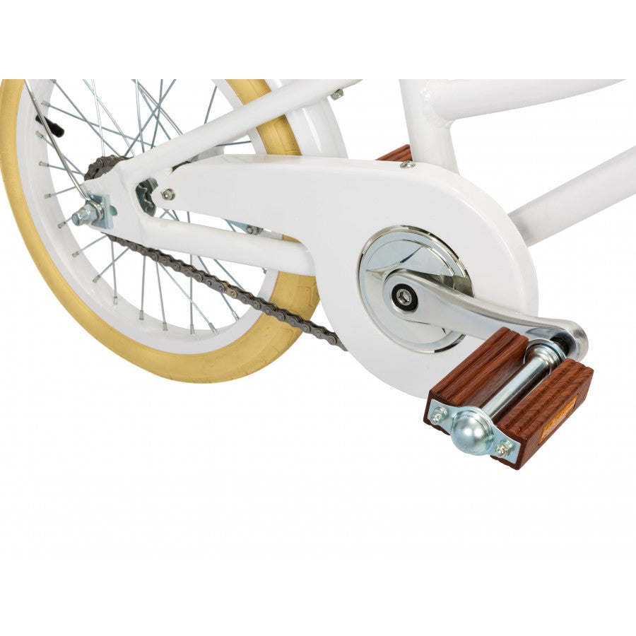 A Banwood Classic Children's Bicycle with a wooden handlebar.