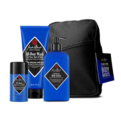 A set of Jack Black Clean and Cool Body Basics, featuring their best-selling daily body care formulas—including a signature All-Over scent body wash, lotion, deodorant, and a black mesh travel bag—arranged against a plain background.