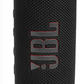 The JBL Flip 6 Waterproof Bluetooth Speaker is a black, cylindrical portable speaker with a fabric exterior, delivering powerful sound. It features a vertically displayed JBL logo and is designed to withstand water exposure.