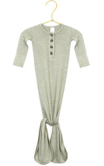 The Lou Lou & Company Baby Collins Plush Knit Knotted Gown is a light green, long-sleeve infant gown featuring a button-down front with four chest buttons, displayed on a gold hanger and designed with a convenient tie-bottom for hassle-free diaper changes.