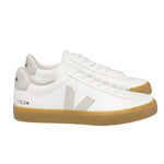 The VEJA Campo Leather Women's Sneaker by Veja boasts a stylish design with white ChromeFree leather, beige accents, and a gum sole. Featuring the "VEJA" logo on the side and heel, these sneakers are an eco-friendly choice perfect for everyday wear. Crafted in Brazil, they offer both fashion and sustainability.