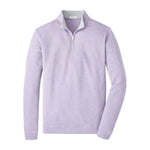The Peter Millar Crown Comfort Pullover is a light purple quarter-zip sweater with long sleeves, a stand-up collar, and visible zipper, offering sweatshirt-like comfort and shown on a white background.